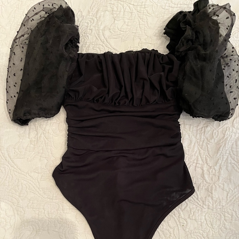 Black puff sleeve bodysuit.
